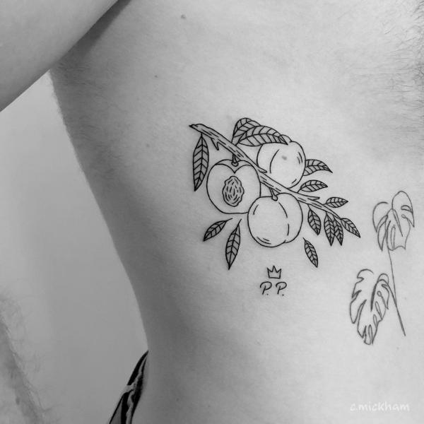 Fin line peach with leaves tattoo