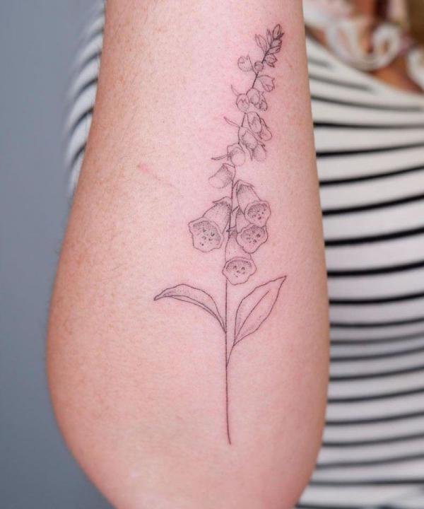Fine line foxglove tattoo