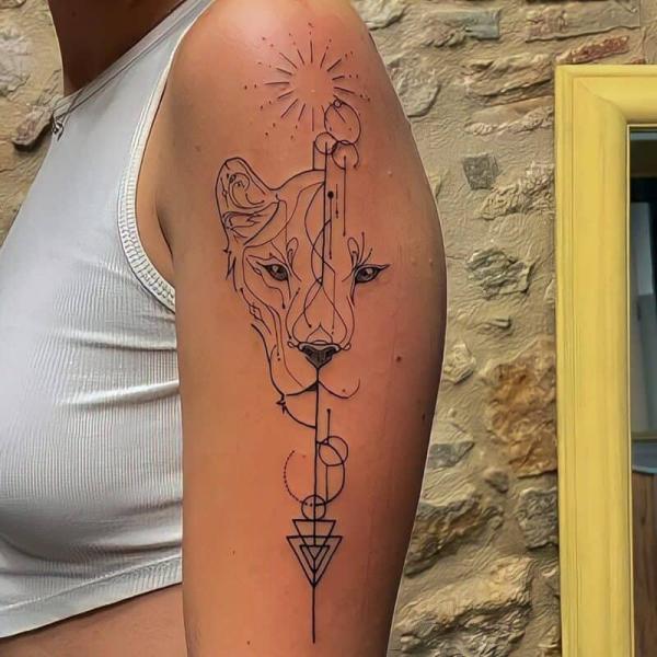 Fineline Leo Lioness with sun Tattoo