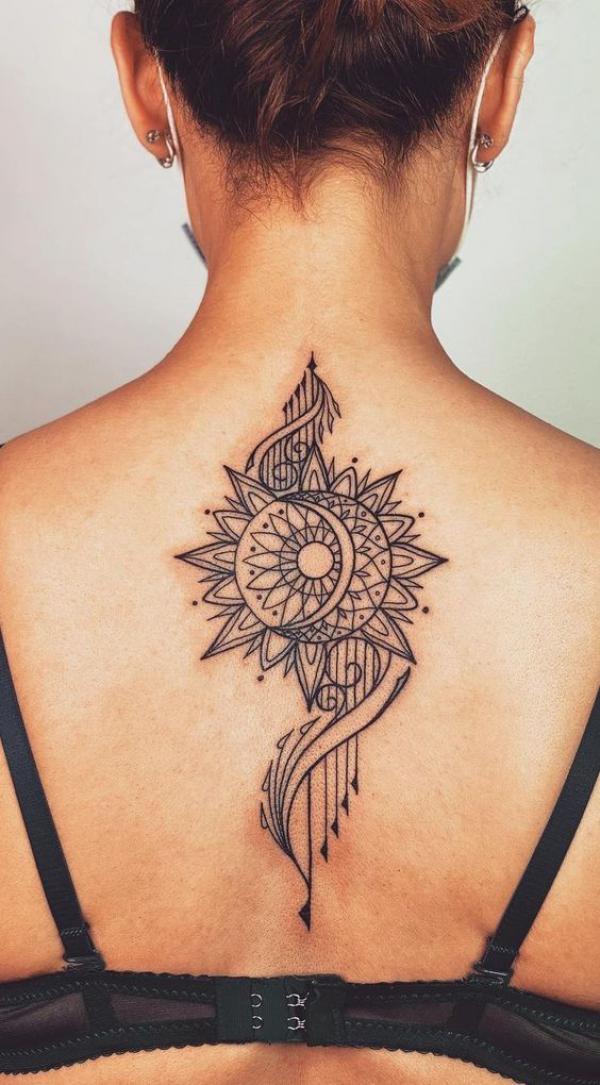 Floral Sun and moon back tattoo