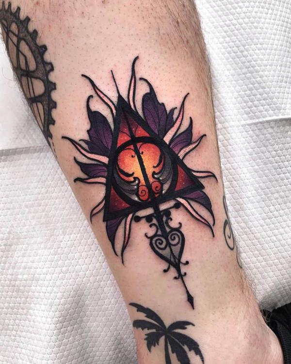 Floral deathly hallows tattoo