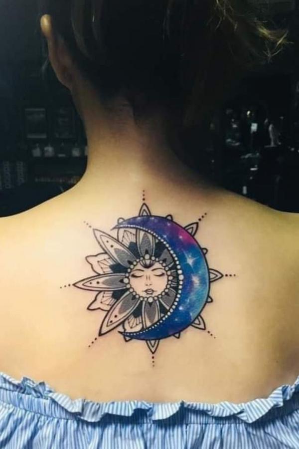 Floral sun and starry crescent moon back tattoo