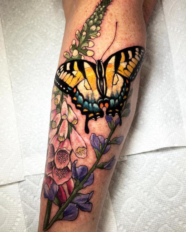 Foxglove and butterfly tattoo