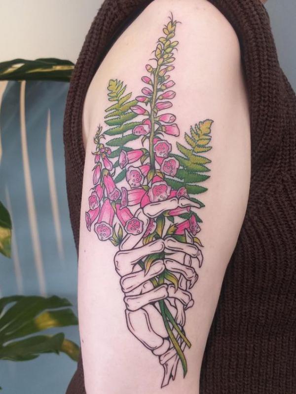 Foxglove and skeleton hand tattoo