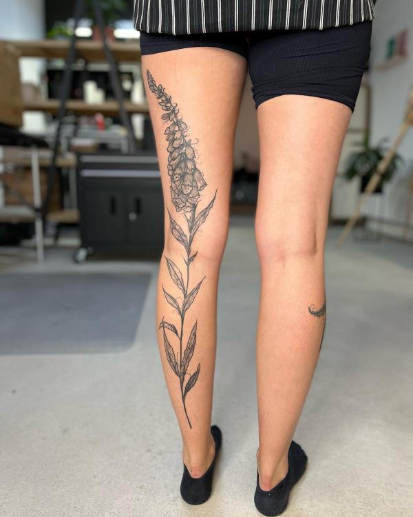 Foxglove leg tattoo