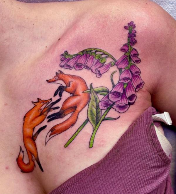Foxglove with a pair of fox tattoo on chest