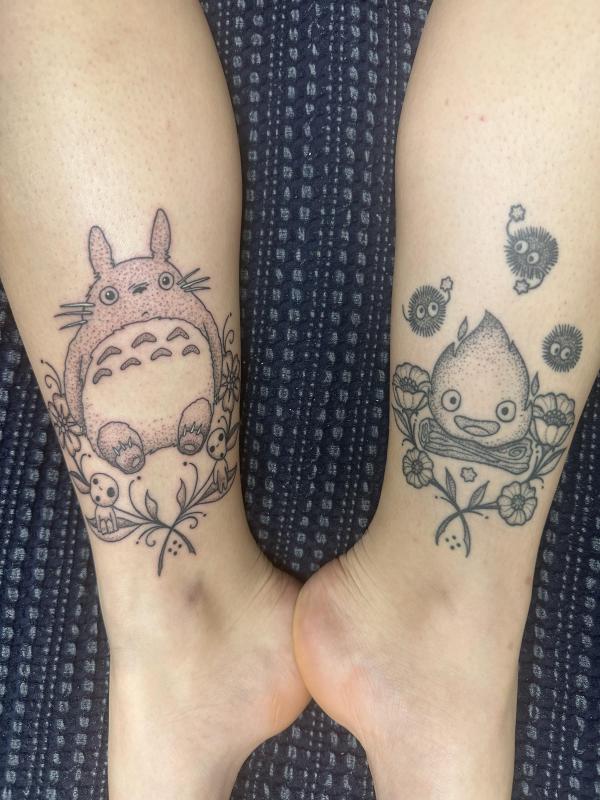 Ghibli Totoro and Calcifer matching tattoo above ankles