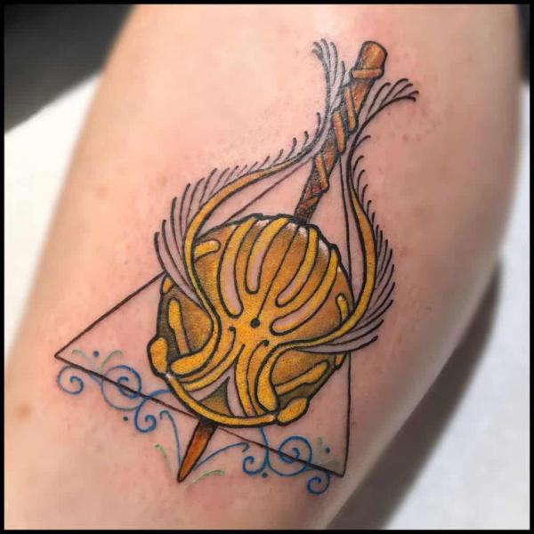Golden snitch and deathly hallows calf tattoo