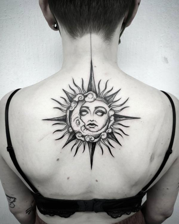 Gothic sun and moon face back tattoo
