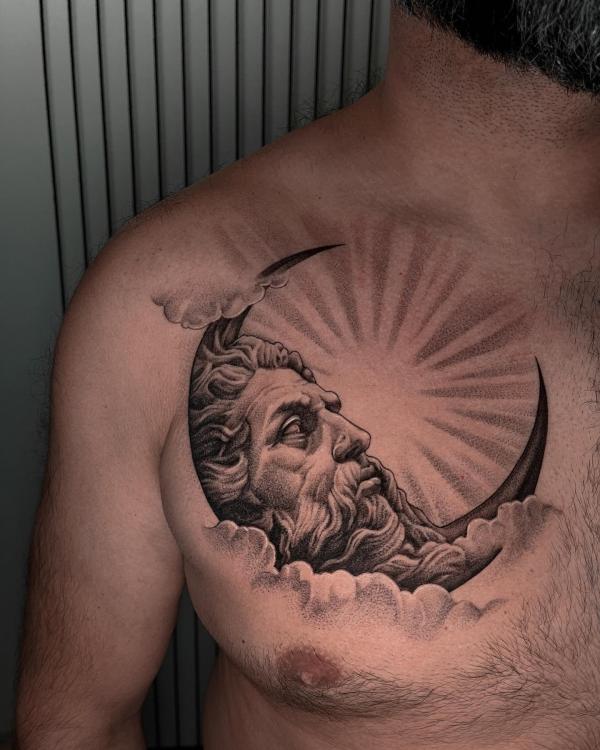Greek God moon and sun chest tattoo