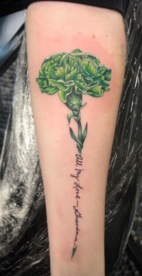 Green carnation tattoo