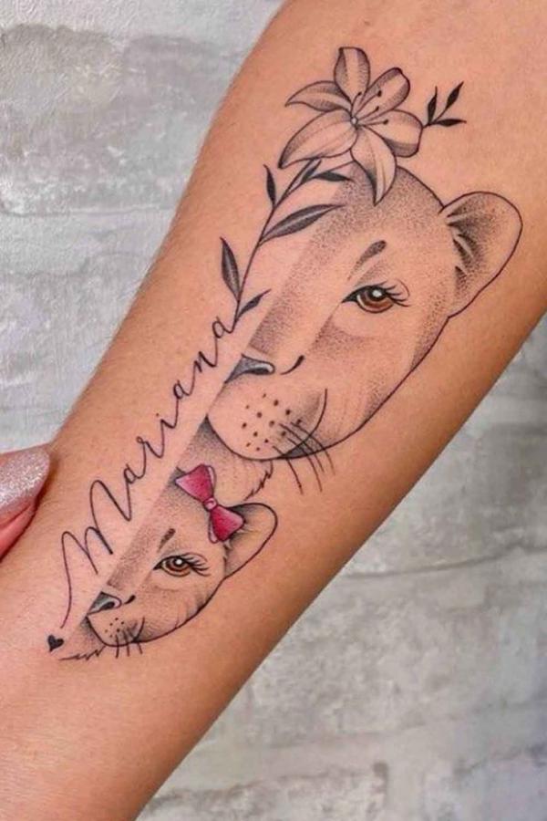 Half face lioness and cub tattoo