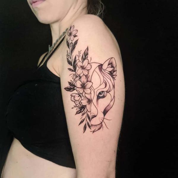 Half flowers half lioness face fine line tattoo