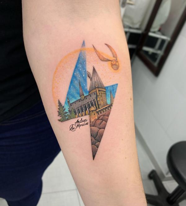 Harry Potter lightning bolt tattoo with Hogwarts castle inside.