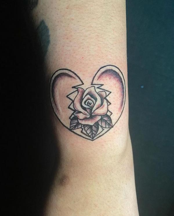 Heart broken with rose tattoo
