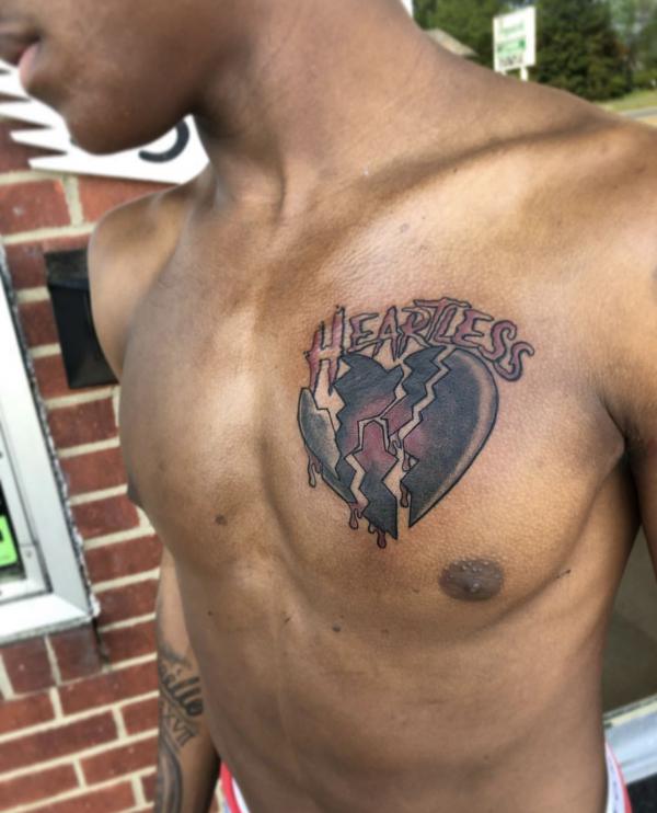 Heartless broken heart tattoo on chest