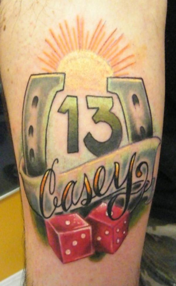 Horseshoe with dices and number 13 tattoo