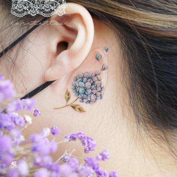 Hydrangea tattoo behind ear