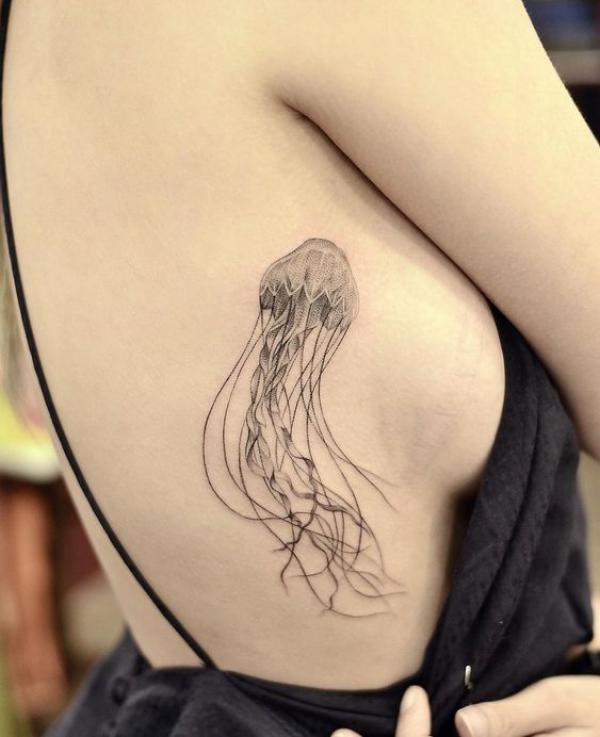 Jellyfish side boob tattoo