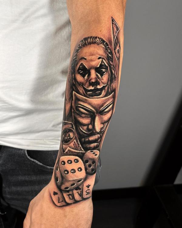 Joker with mask and dices tattoo