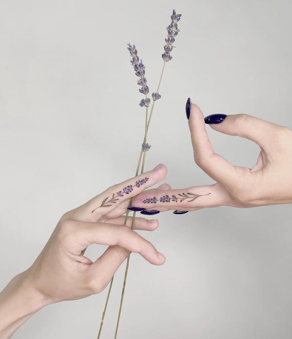 Lavender finger tattoo