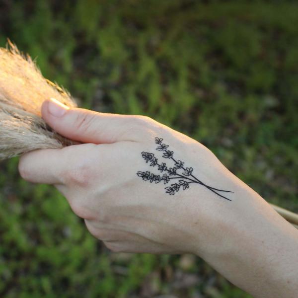 Lavender hand tattoo