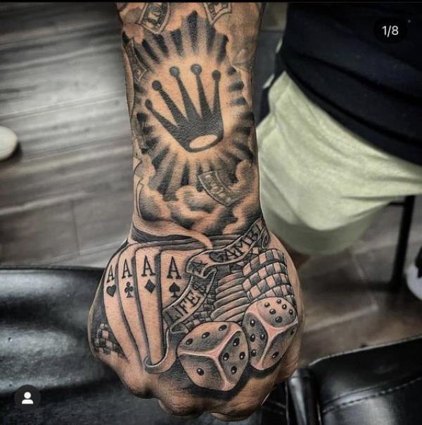 Lifes a gamble with dices and cards hand tattoo