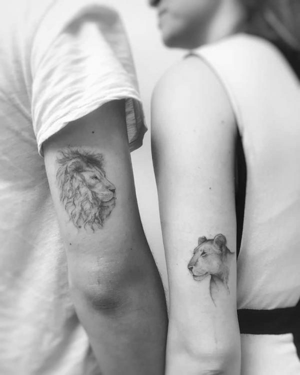 Lion and lioness couple tattoo black and grey