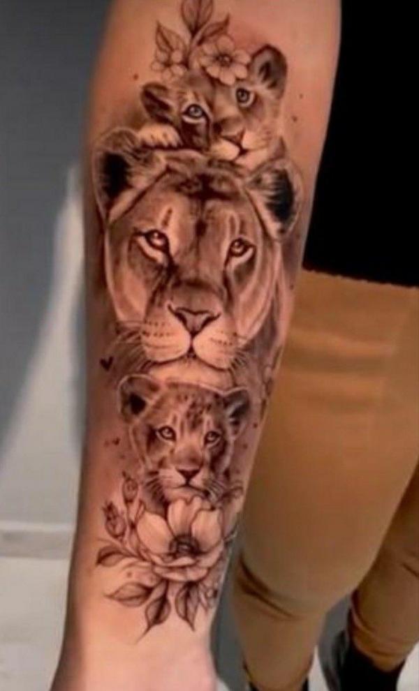 Lioness and 2 cubs with flower tattoo