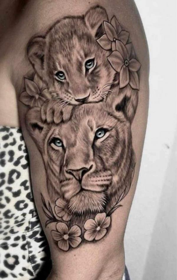 Lioness and cub half sleeve tattoo