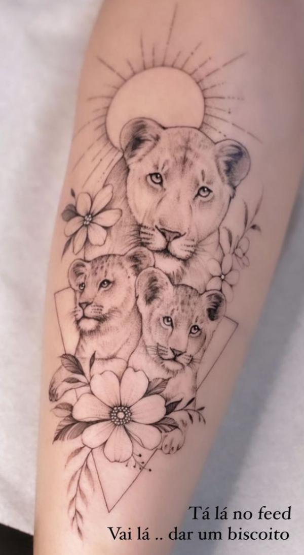 Lioness and cub with moon tattoo