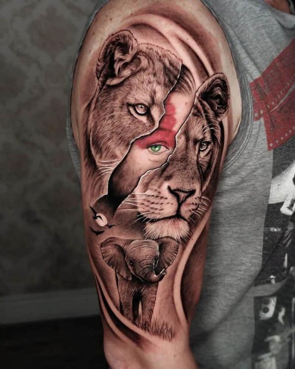 Lioness mask and elephant tattoo