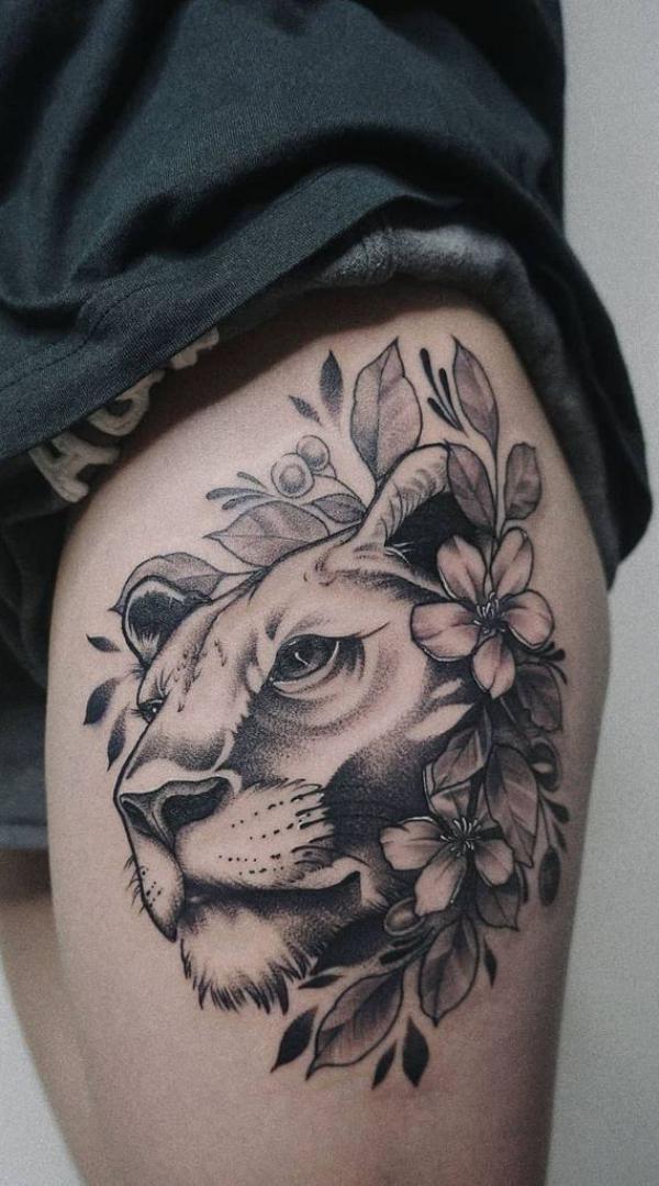 Lioness thigh tattoo