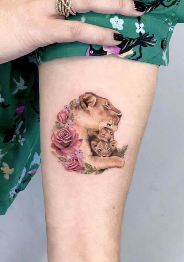 Lioness with 2 cubs with roses tattoo