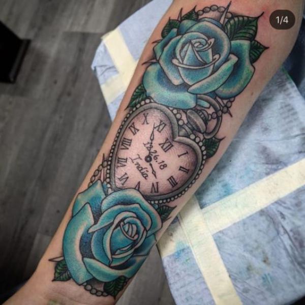 Love shaped pocket watch with blue roses