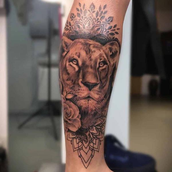 Mandala lioness lower leg tattoo