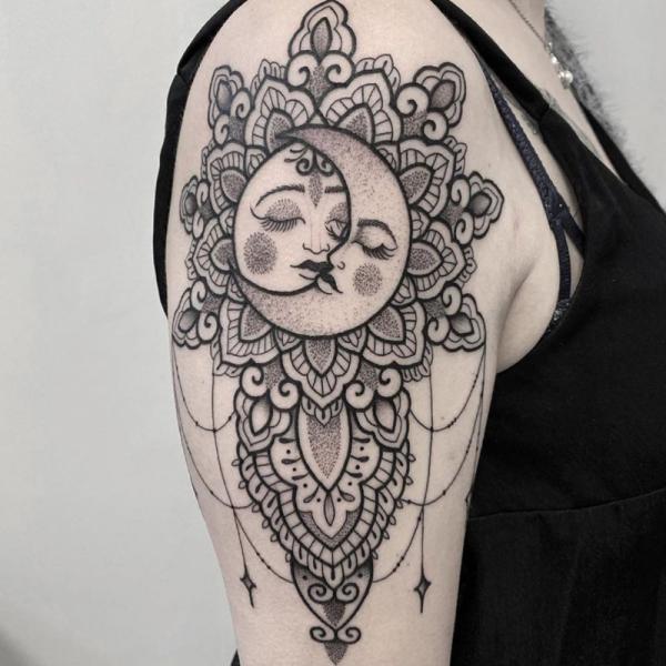 Mandala sun and moon half sleeve tattoo
