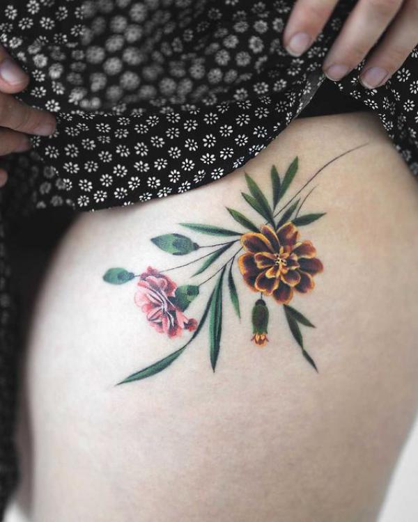 Marigold and Carnation flowers tattoo