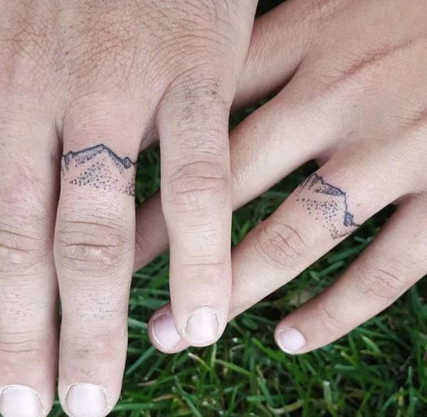 Mountain finger tattoo
