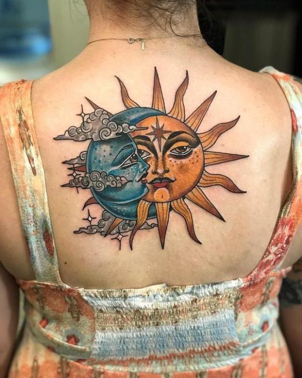 Neo traditional sun and moon with clouds tattoo on back