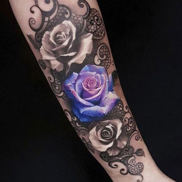 One purple rose with two black and grey ones on lace tattoo