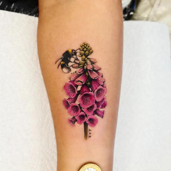 Pink foxglove with bee tattoo