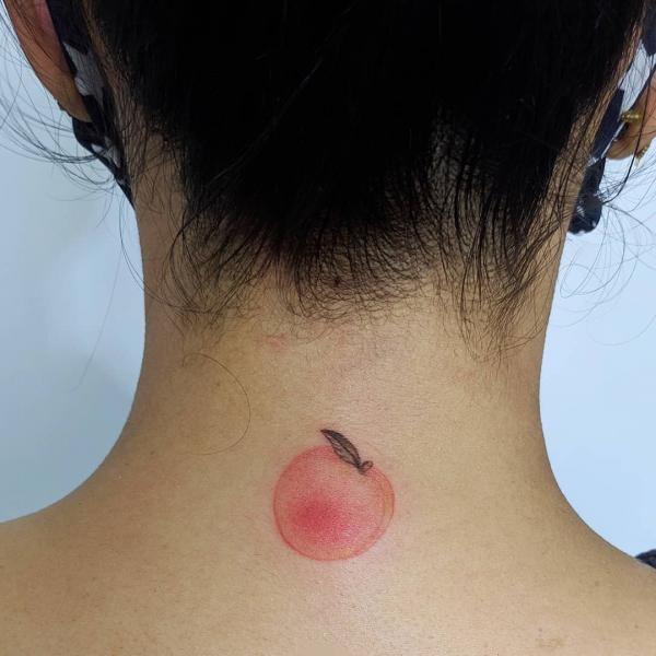 Pink peach nape tattoo