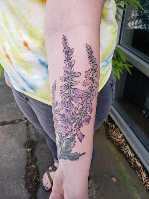 Purple foxglove inner forearm tattoo