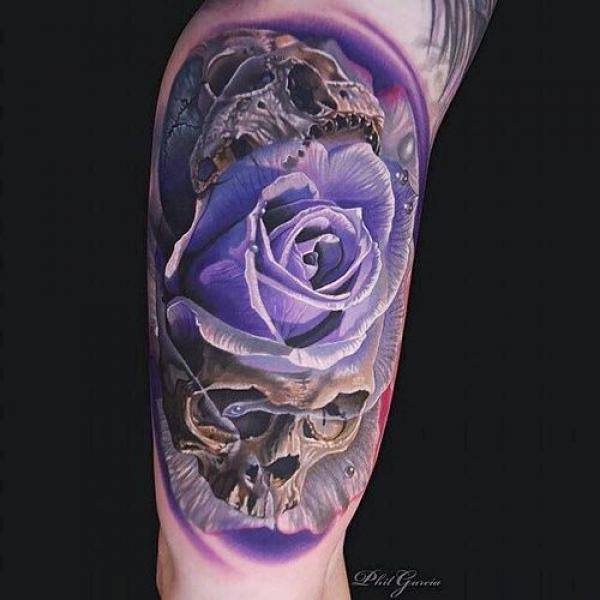 Purple rose and skull tattoo