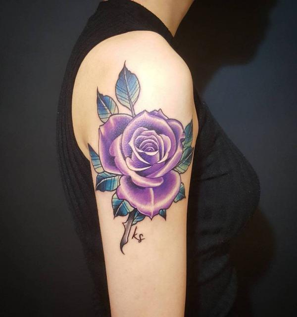 Purple rose arm tattoos