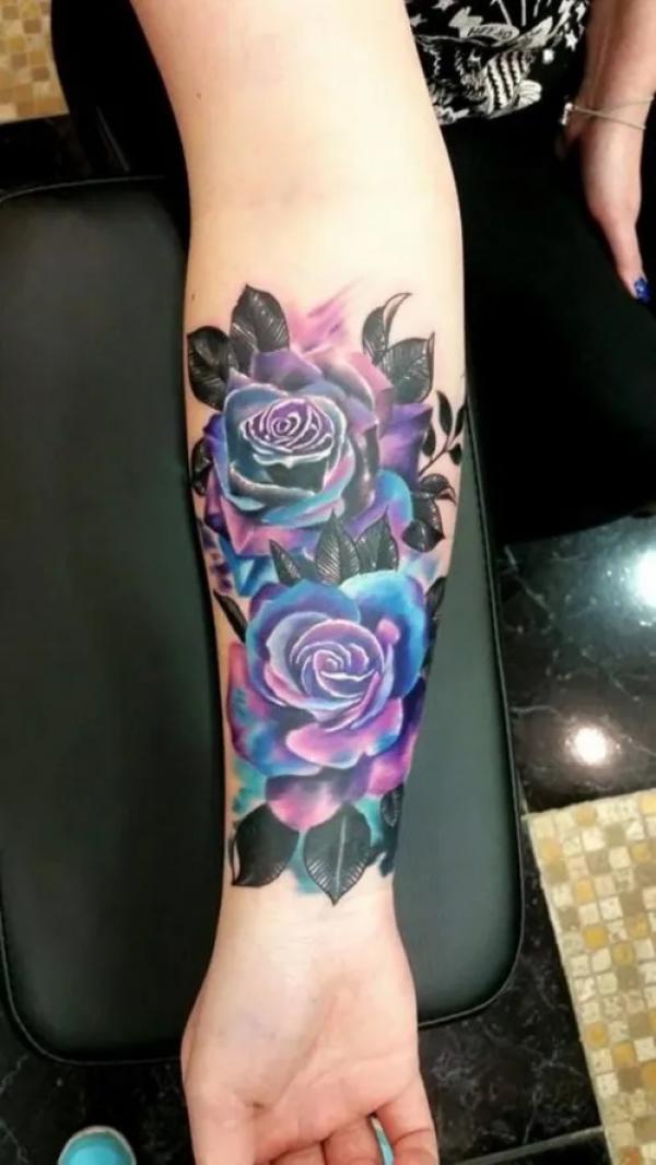 Purple rose forearm tattoo