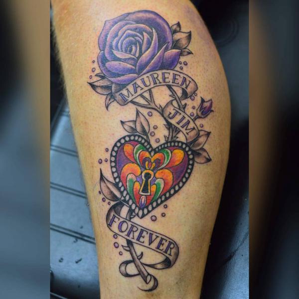 Purple rose with heart symbol and banner bearing a name