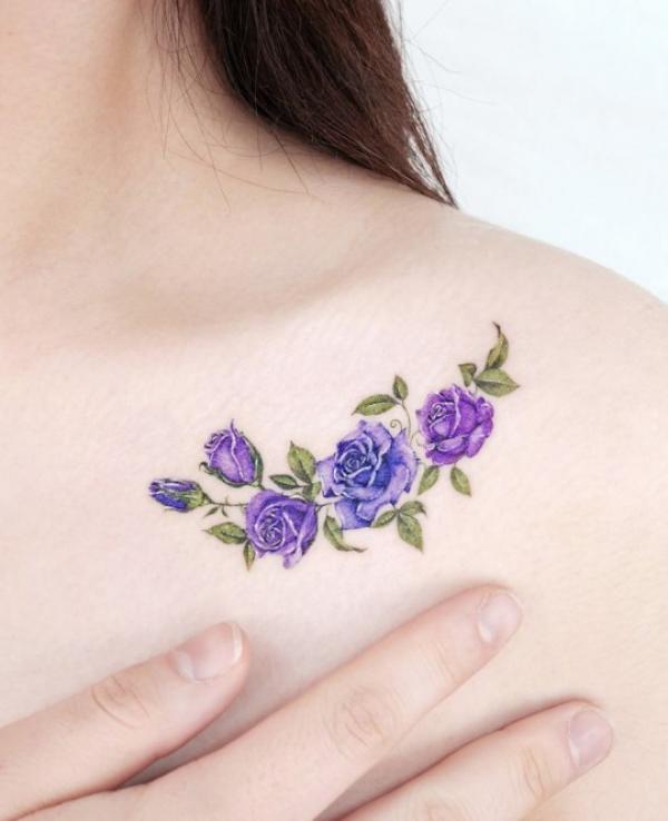 Purple roses clavicle tattoo