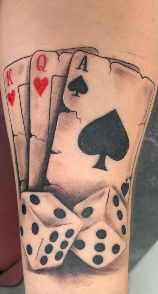 Realistic cards and dices tattoo
